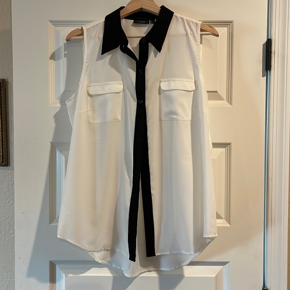 White and black sleeveless blouse size large